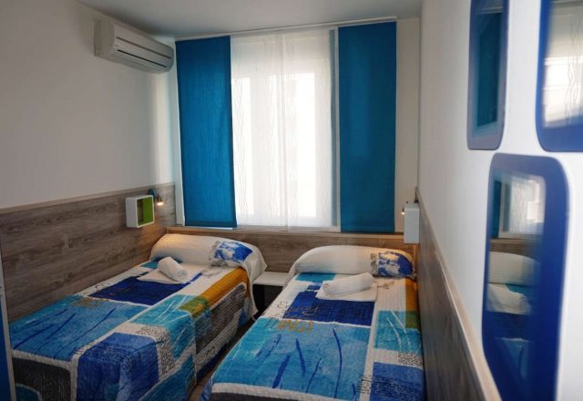 Habitación Triple con baño compartido